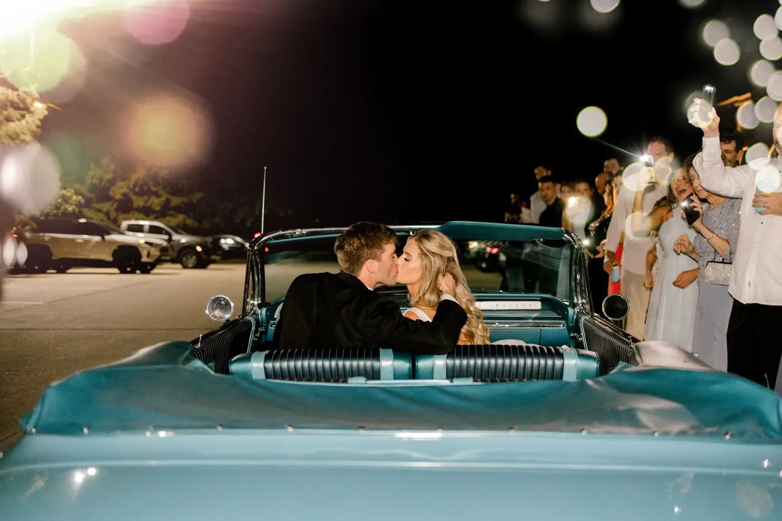 A wedding party with a Chance Classics car